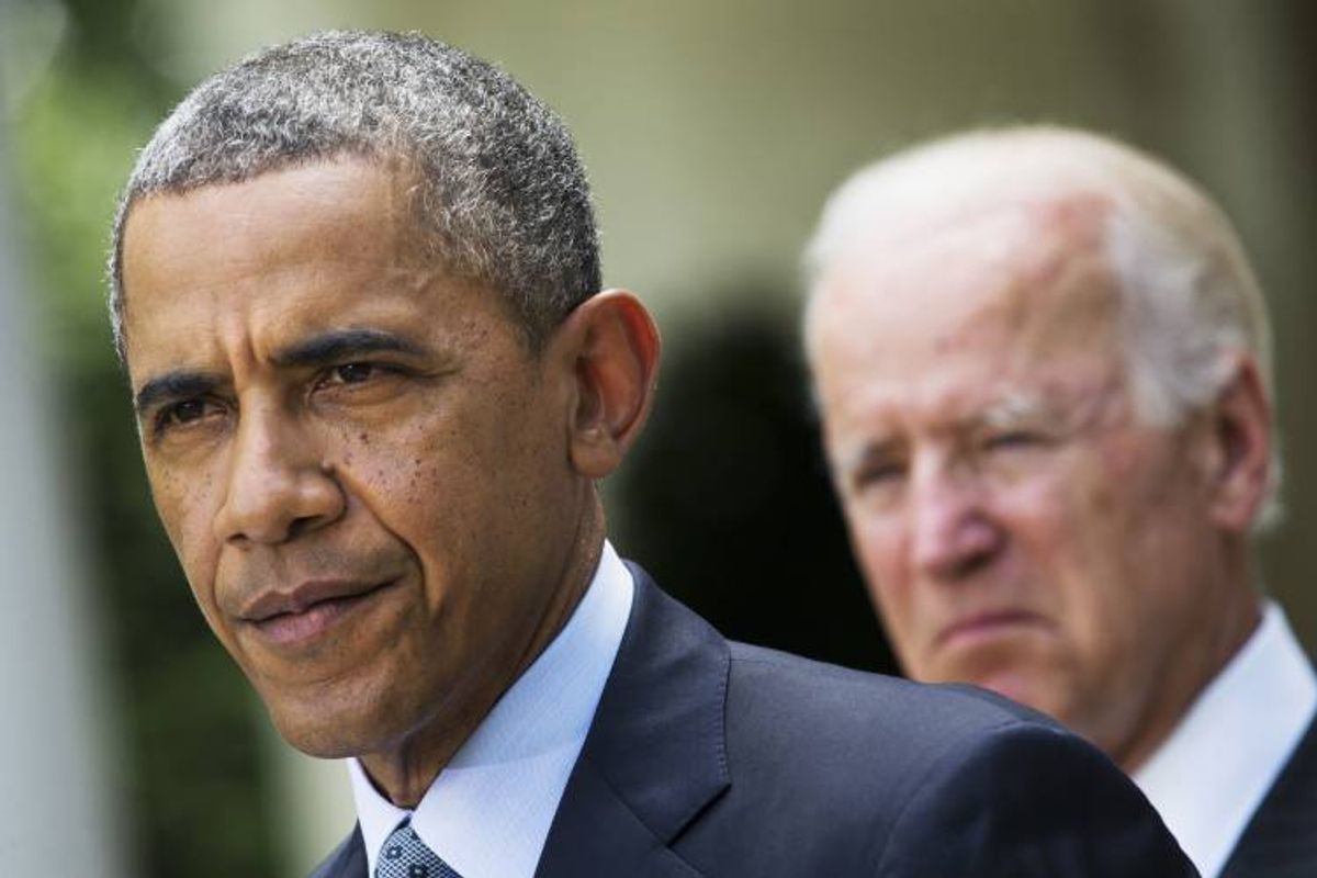 President Barack Obama, accompanied by Vice President Joe Biden  (AP Photo/Jacquelyn Martin)