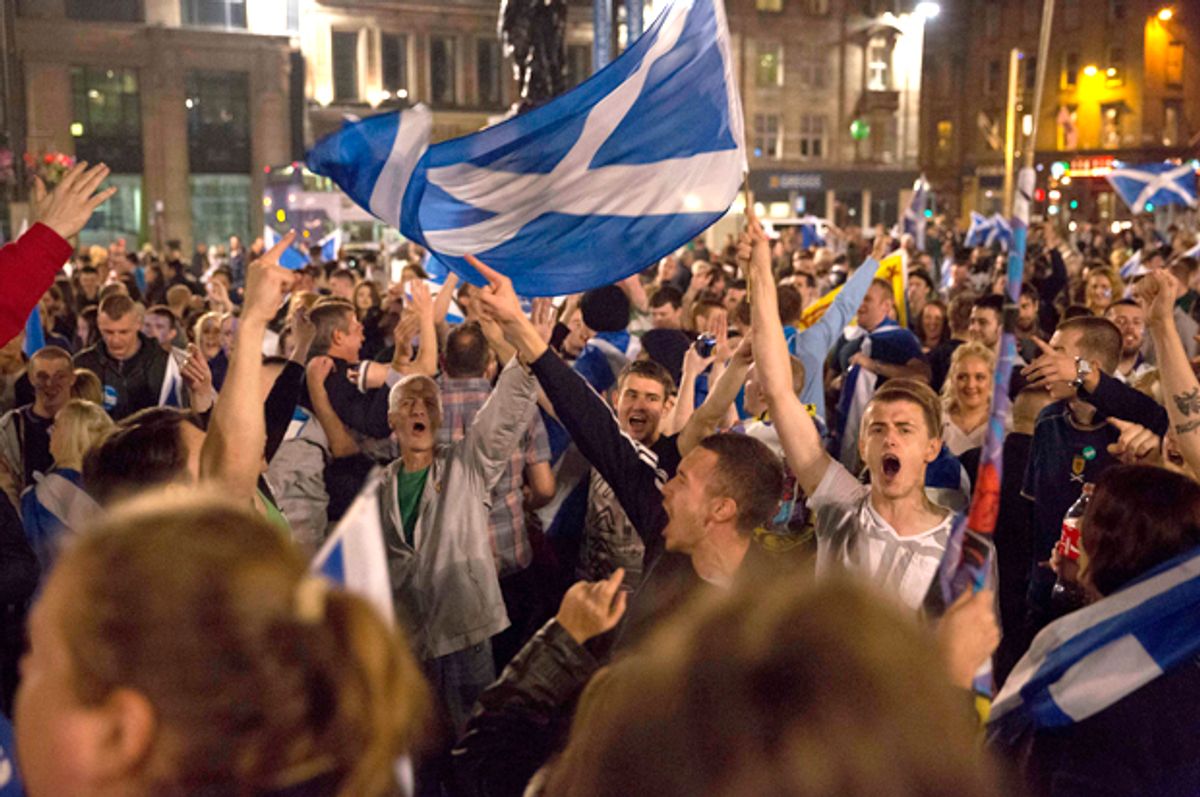 Supporters of the Yes campaign in the Scottish independence referendum in George Square, Glasgow, Scotland, Sept. 18, 2014.     (AP/Matt Dunham)