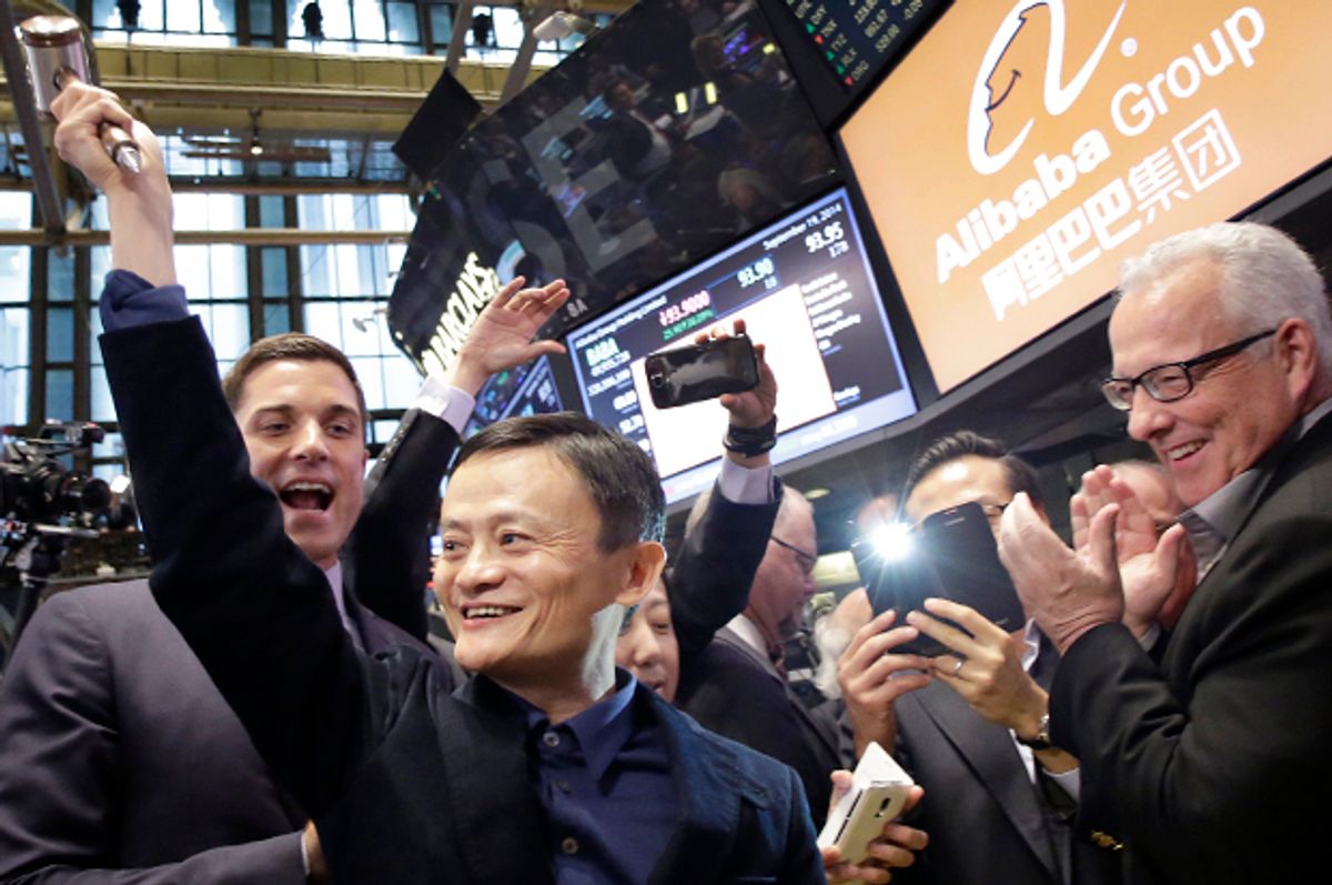 Jack Ma, founder of Alibaba, raises a ceremonial mallet during the company's IPO at the New York Stock Exchange, Sept. 19, 2014.   (AP/Mark Lennihan)