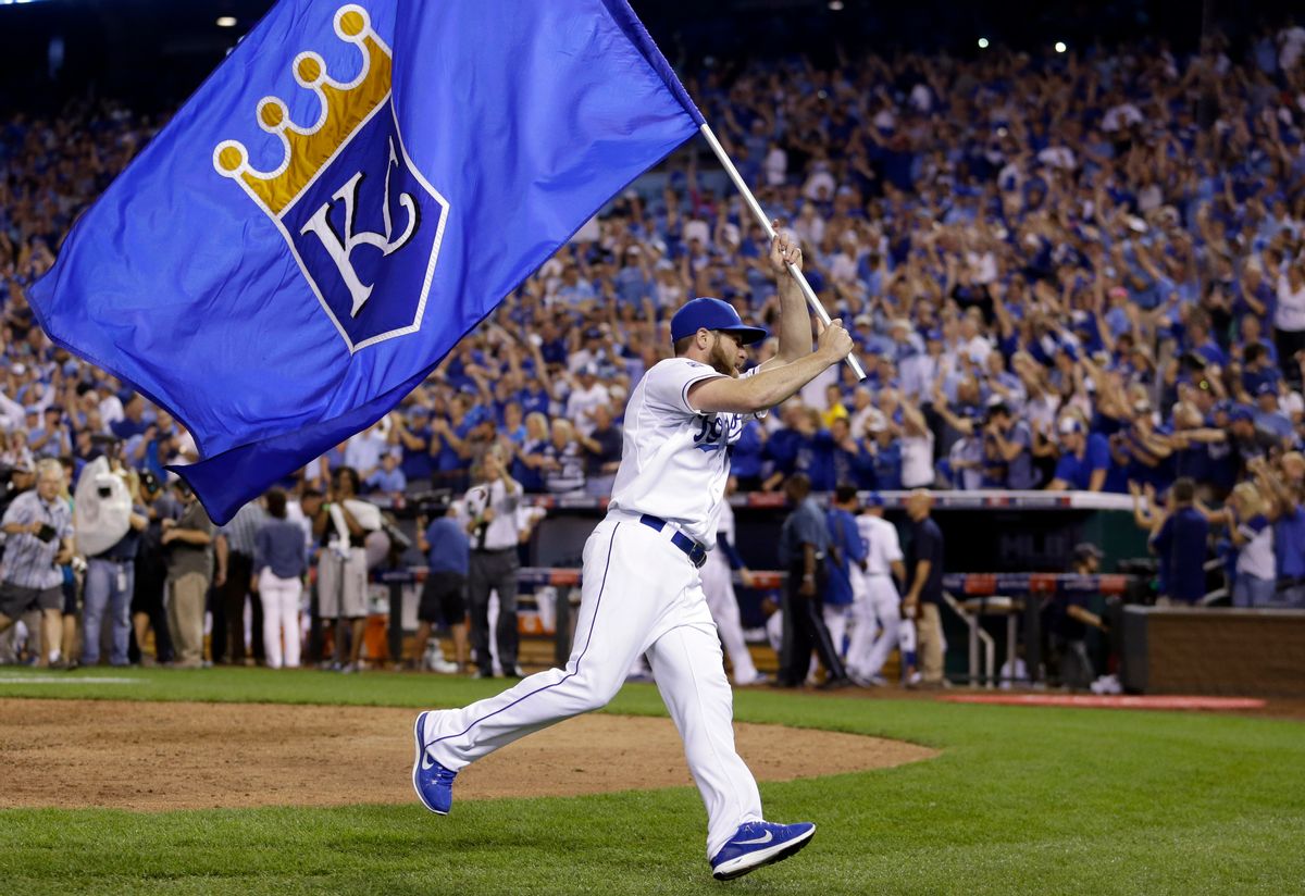 Kansas City Royals' Greg Holland celebrates after the Royals' 9-8 victory over the Oakland Athletics in 12 innings in the AL wild-card playoff baseball game Tuesday, Sept. 30, 2014, in Kansas City, Mo. (AP Photo/Jeff Roberson) (AP)