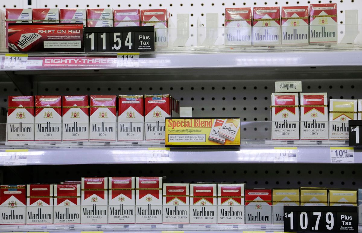 Marlboro cigarettes are displayed at a Walgreens pharmacy, Wednesday, Oct. 29, 2014 in New York. (AP Photo/Mark Lennihan) (AP)