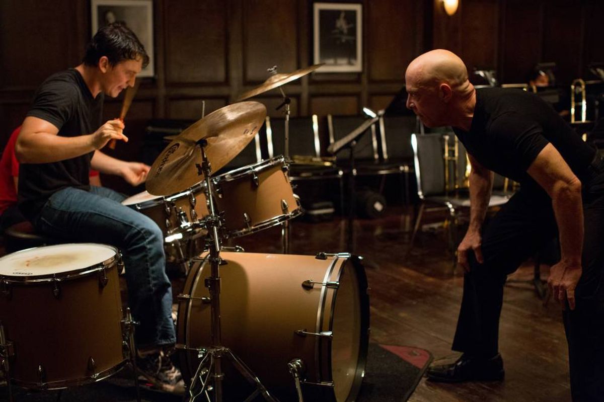 This image released by Sony Pictures Classics shows Miles Teller, left, and J.K. Simmons in a scene from "Whiplash." (AP Photo/Sony Pictures Classics, Daniel McFadden)