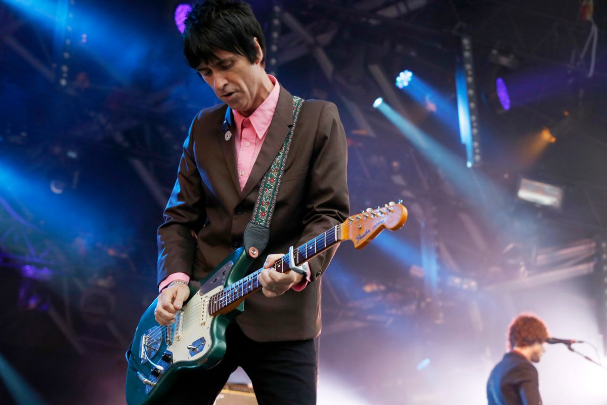 FILE - In this Aug. 1, 2014 file photo, British singer Johnny Marr performs at Camp Bestival at Lulworth Castle in Dorset, England.The former guitarist for The Smiths has just released his second solo album, "Playland," a follow-up to well-received 2013 effort "The Messenger." Both offer robust, richly textured guitar rock _ the latest of Marr's many musical modes.  (Photo by Jim Ross/Invision/AP, File) (Jim Ross/invision/ap)