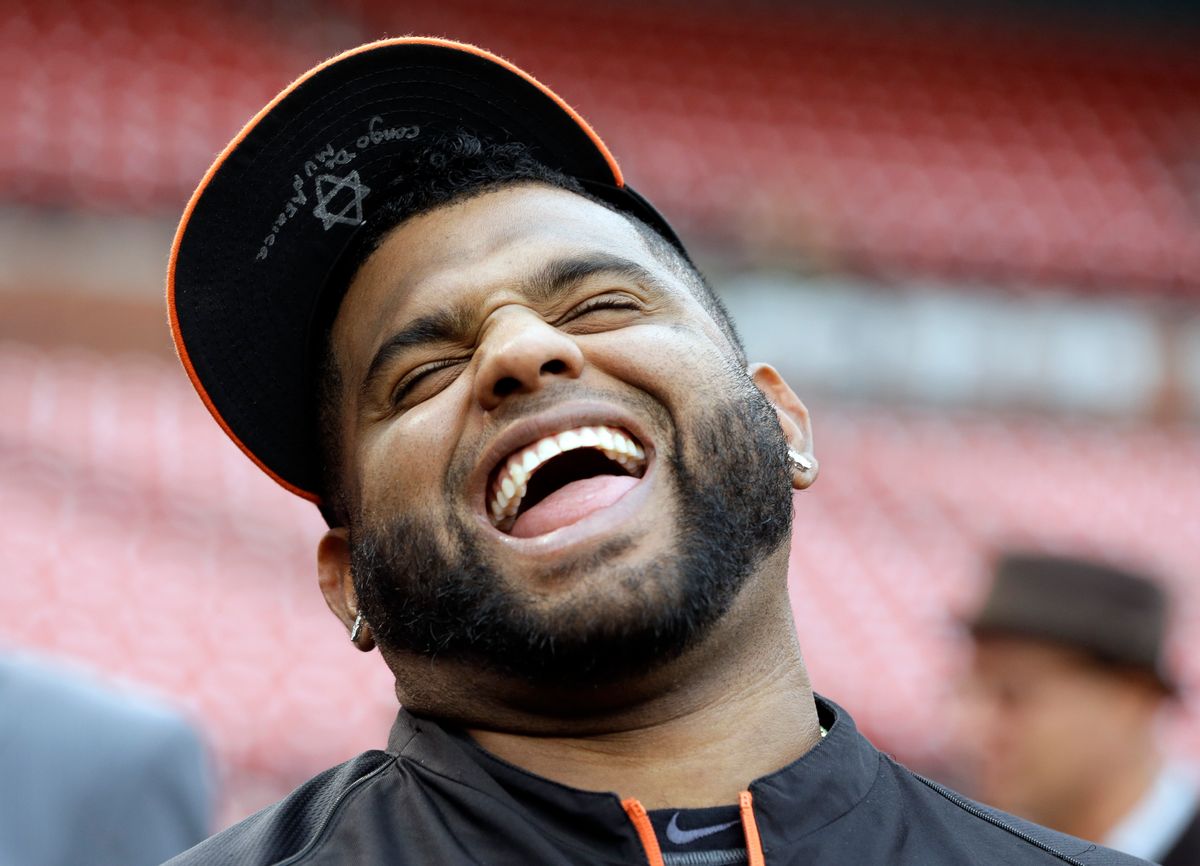 San Francisco Giants' Pablo Sandoval laughs during batting practice before Game 1 of the National League baseball championship series against the St. Louis Cardinals Saturday, Oct. 11, 2014, in St. Louis. (AP Photo/Jeff Roberson) (Jeff Roberson)