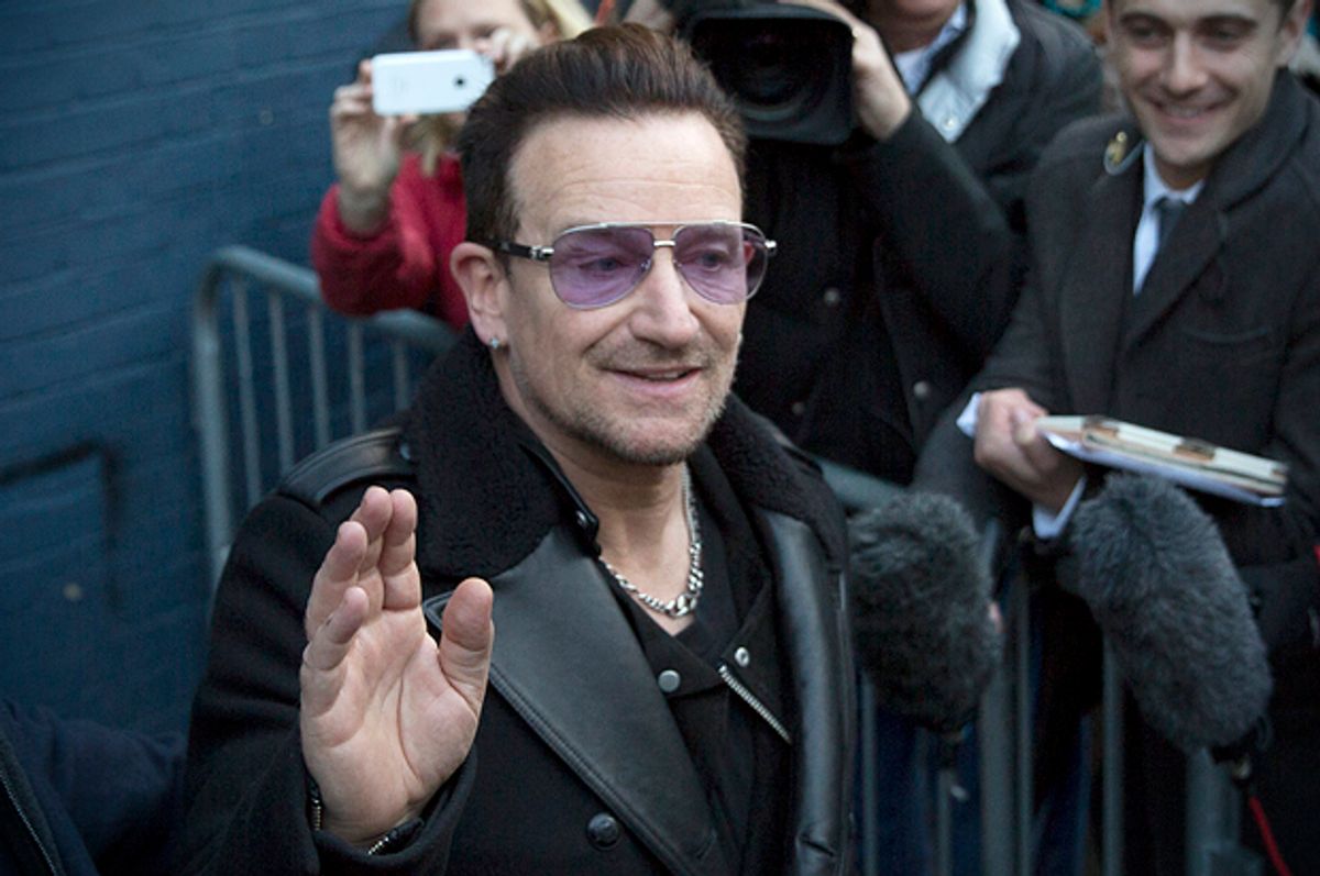 Bono leaves the recording of the Band Aid 30 charity single in west London,  November 15, 2014.         (Reuters/Neil Hall)