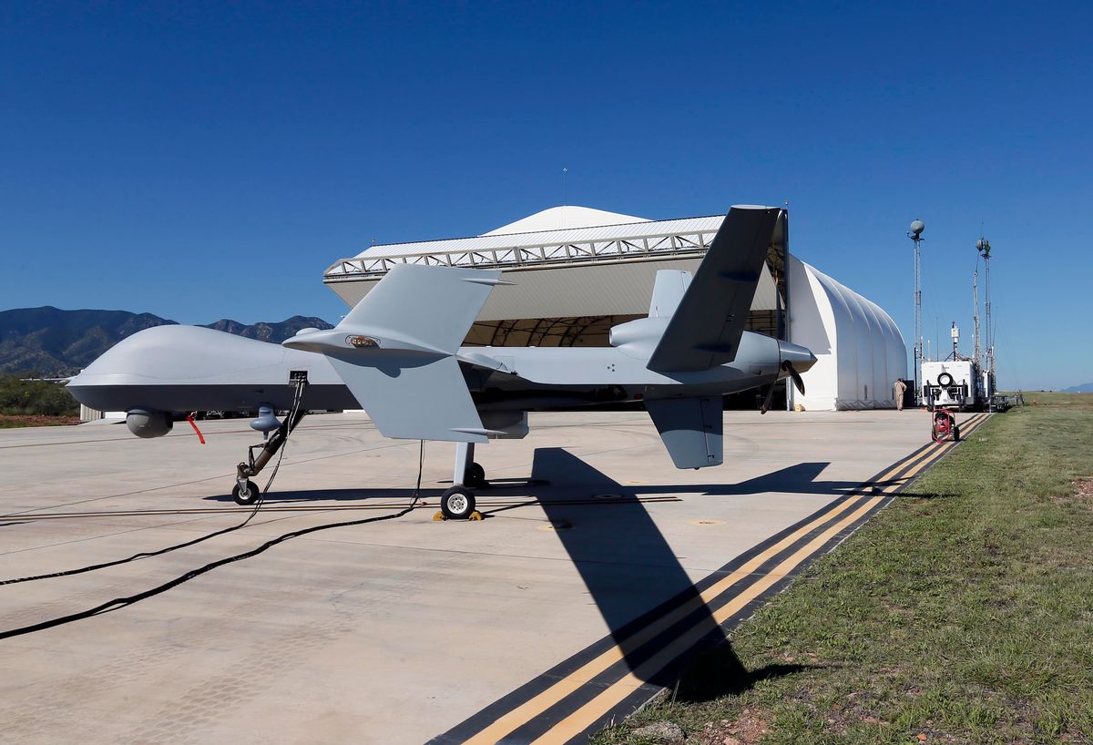 A U.S. Customs and Border Patrol drone aircraft is prepped prior to it's flight, Wednesday, Sept 24, 2014 at Ft. Huachuca in Sierra Vista, Ariz. The U.S. government now patrols nearly half the Mexican border by drones alone in a largely unheralded shift to control desolate stretches where there are no agents, camera towers, ground sensors or fences, and it plans to expand the strategy to the Canadian border. It represents a significant departure from a decades-old approach that emphasizes boots on the ground and fences. (AP Photo/Matt York) (AP)