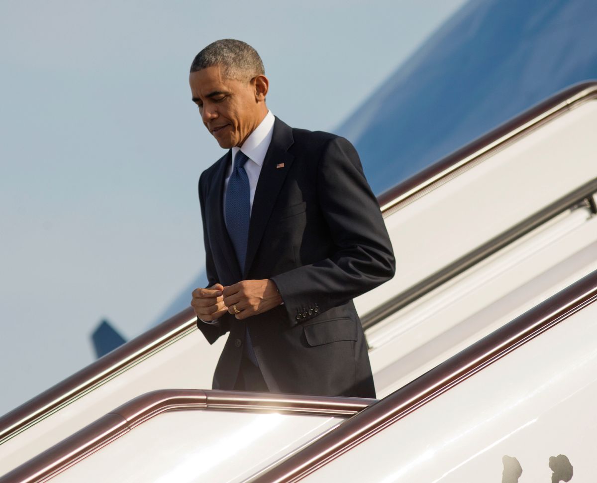 US President Barack Obama during his arrival on Air Force One at Beijing Capital International Airport, Monday, Nov. 10, 2014 in Beijing, China. Obama is in China to attend the Asia-Pacific Economic Cooperation (APEC) Summit. (AP Photo/Pablo Martinez Monsivais) (Pablo Martinez Monsivais)