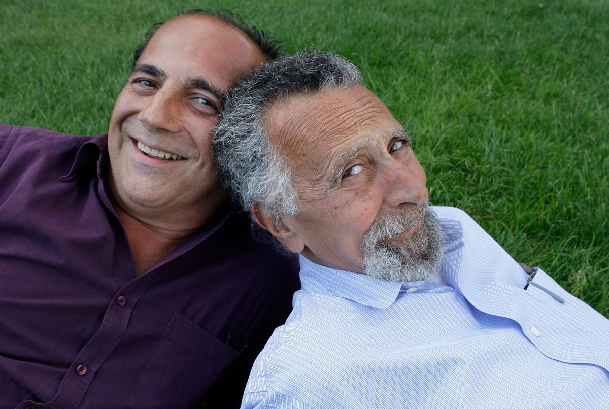 In this June 19, 2008 photo, brothers Ray, left, and Tom Magliozzi, co-hosts of National Public Radio's "Car Talk" show, pose for a photo in Cambridge, Mass. NPR says Tom Magliozzi died Monday, Nov. 3, 2014 of complications from Alzheimer's disease. He was 77. (AP Photo/Charles Krupa) (AP)