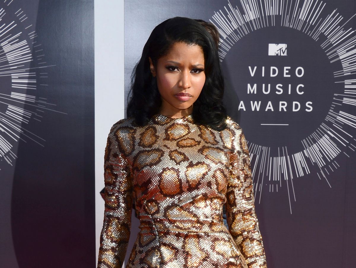 FILE - In this Aug. 24, 2014 file photo, Nicki Minaj arrives at the MTV Video Music Awards in Inglewood, Calif. Minaj is apologizing for a video that some feel uses Nazi imagery. The rapper posted on Twitter Tuesday, Nov. 11, that she didnt create the concept for the lyric video for her song Only. She wrote: (I) take full responsibility if it has offended anyone. I'd never condone Nazism in my art. (Photo by Jordan Strauss/Invision/AP, File) (Jordan Strauss/invision/ap)