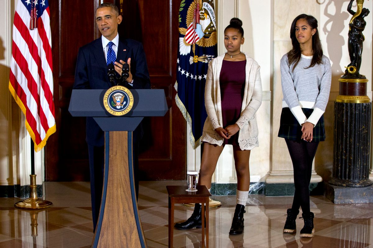 President Barack Obama with his daughters, Sasha and Malia                (Associated Press)