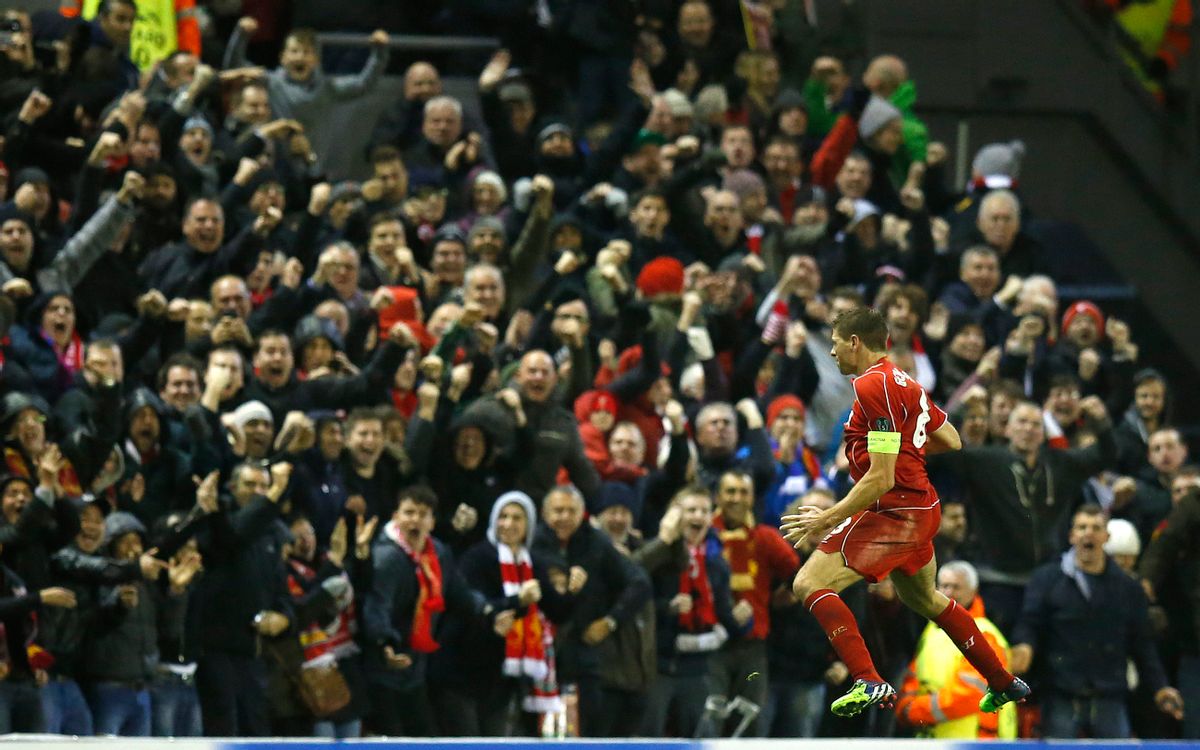 Liverpool's Steven Gerrard celebrates after scoring his side's first goal during the Champions League Group B soccer match between Liverpool and FC Basel at Anfield Stadium in Liverpool, England, Tuesday, Dec. 9, 2014. (AP Photo/Jon Super) (Jon Super)
