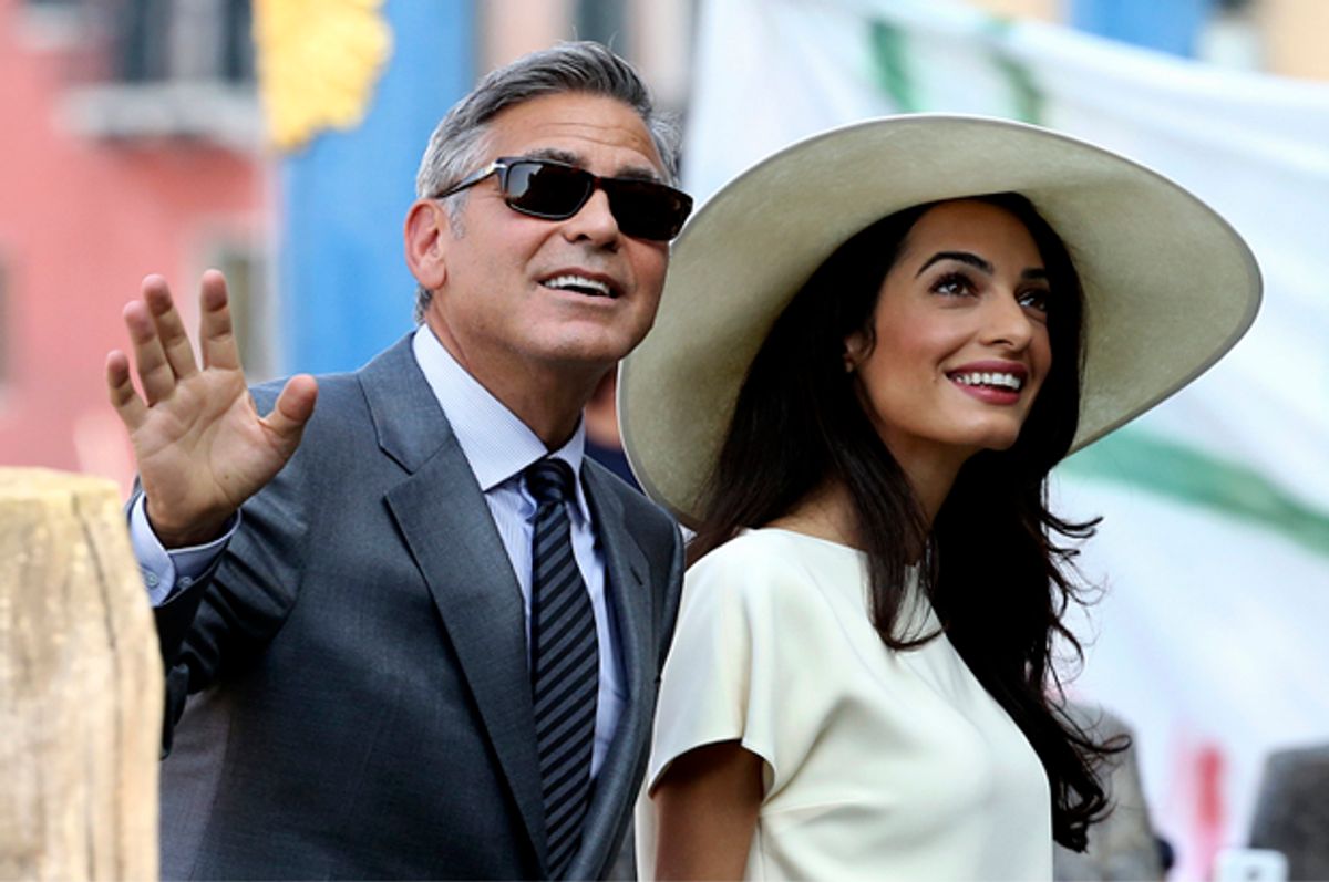 Amal and George Clooney         (Reuters/Alessandro Bianchi)