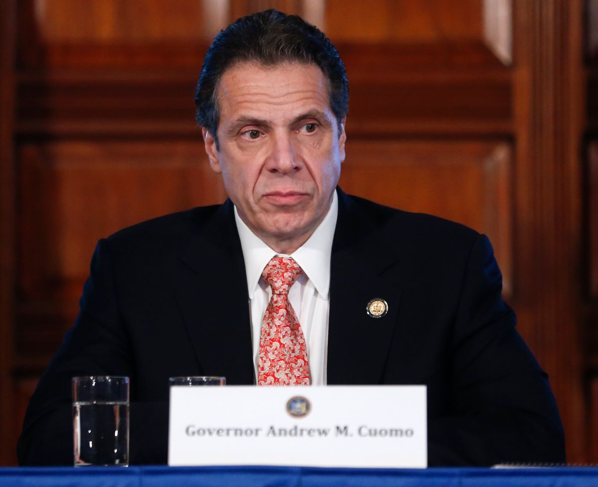 New York Gov. Andrew Cuomo watches a presentation on hydraulic during a cabinet meeting at the Capitol on Wednesday, Dec. 17, 2014, in Albany, N.Y. Cuomos administration will move to prohibit fracking in the state, citing unresolved health issues and dubious economic benefits of the widely used gas-drilling technique. (AP Photo/Mike Groll)  (AP)