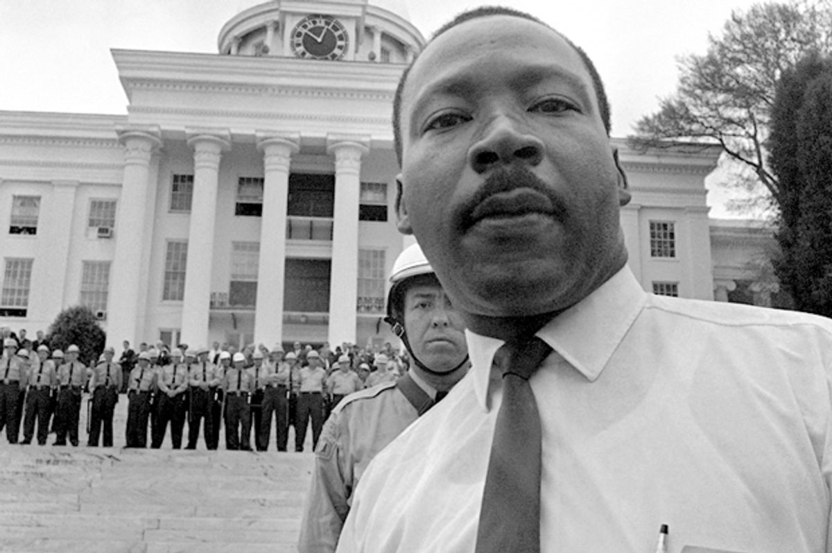 State troopers stand shoulder to shoulder on the steps of Alabama's State Capitol on March 25, 1965, barring Dr. Martin Luther King, Jr. from entering.       (AP)