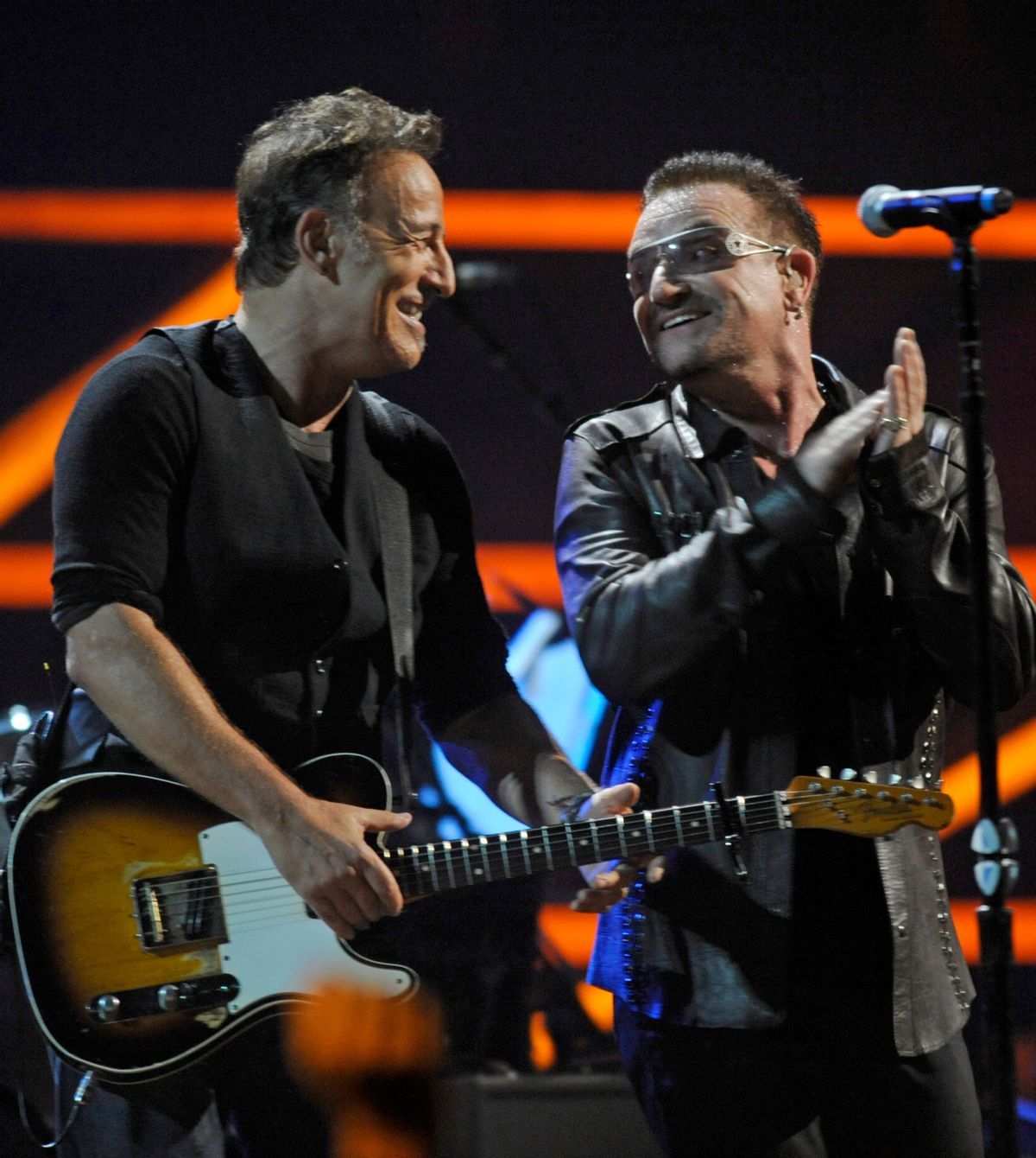 FILE - In this Oct. 30, 2009 file photo, Bono, right, and Bruce Springsteen perform at the 25th Anniversary Rock & Roll Hall of Fame concert at Madison Square Garden, in New York. Springsteen and Coldplays Chris Martin will act as Bono at a concert Monday night, Dec. 1, 2014, in New York City. U2 announced on its website that the singers will perform at Duffy Square in Times Square alongside Kanye West and Carrie Underwood for U2 Minus 1 _ Live in New York Tonight. (AP Photo/Henny Ray Abrams, File)  (AP)