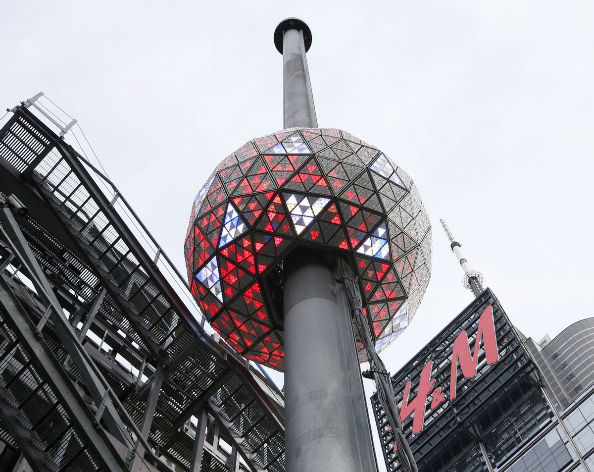 The Waterford crystal ball is lit during a test for the New Year's Eve celebration atop One Times Square in New York, Tuesday, Dec. 30, 2014. The ball, which is 12 feet in diameter and weighs 11,875 pounds, is decorated with 2,688 Waterford crystals and illuminated by 32,256 LED lights. (AP Photo/Kathy Willens) (AP)
