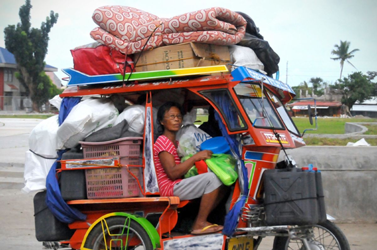 Evacuees in central Philippines, Dec. 4, 2014, in anticipation of the incoming Typhoon Hagupit.     (AP/Paul Cinco)