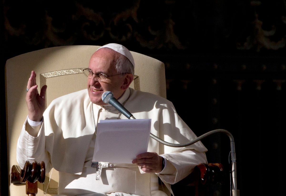 Pope Francis delivers his speech during his weekly general audience in St. Peter's Square at the Vatican, Wednesday, Dec. 17, 2014.        (AP/Alessandra Tarantino)