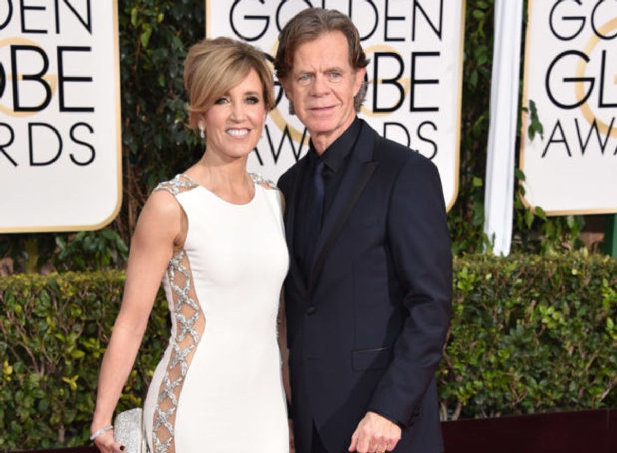 Felicity Huffman, left, and William H. Macy arrive at the 72nd annual Golden Globe Awards at the Beverly Hilton Hotel on Sunday, Jan. 11, 2015, in Beverly Hills, Calif. (Photo by John Shearer/Invision/AP) (John Shearer/invision/ap)