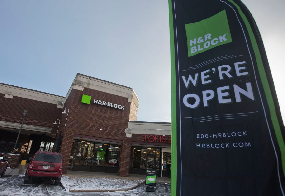In this Thursday, Jan. 8, 2015 photo, an ad banner appears on display in the parking lot of the H&amp;R Block offices in the Atlas District in Washington. The Internal Revenue Service said it would begin accepting electronic returns and processing paper ones as scheduled on Jan. 20, 2015.  (AP Photo/Pablo Martinez Monsivais) (AP Photo/Pablo Martinez Monsivais)