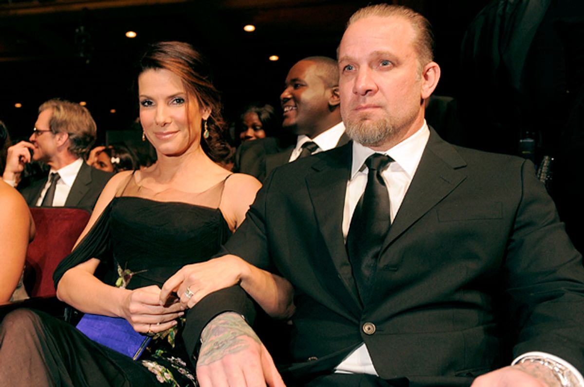 Sandra Bullock with then husband Jesse James, Feb. 26, 2010.     (AP/Chris Pizzello)