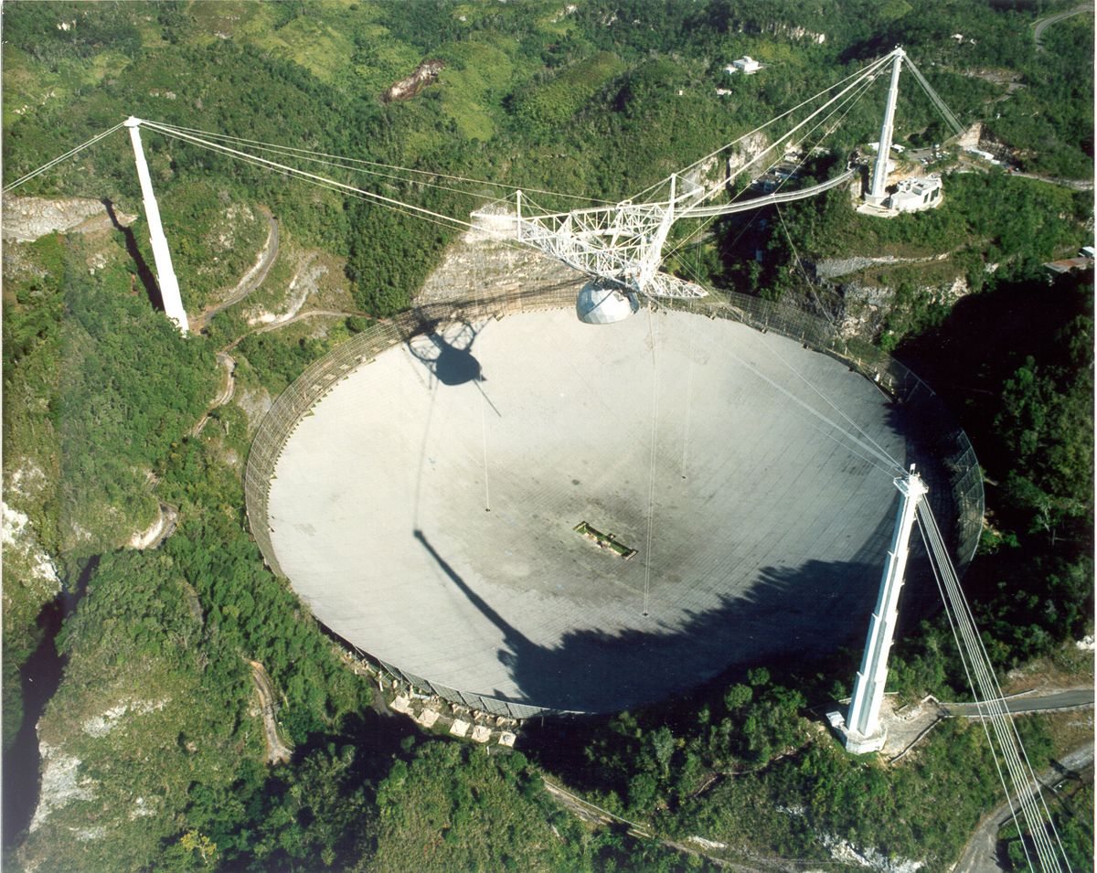 This undated handout photo provided by Seth Shostak, SETI Institute, shows the Arecibo radio telescope in Puerto Rico.  (AP Photo/Seth Shostak, SETI Institute)