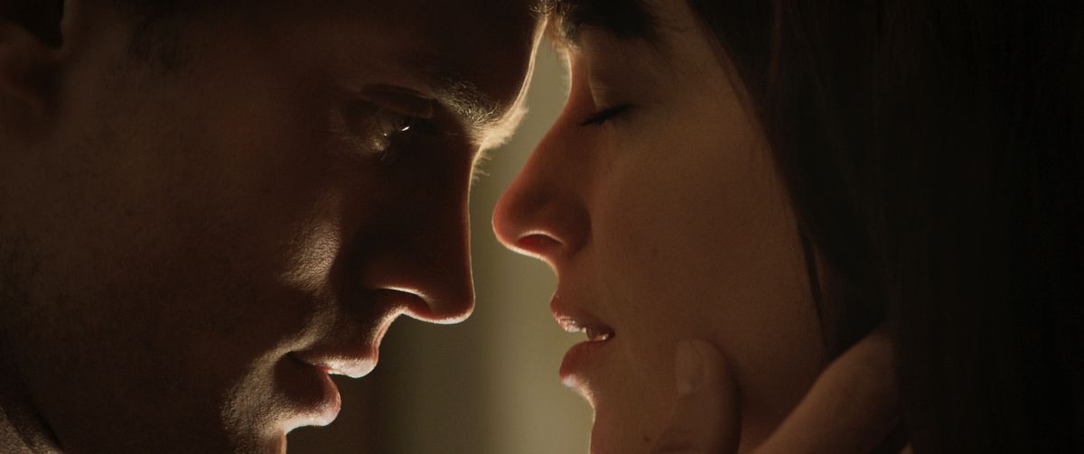 Jamie Dornan and Dakota Johnson in a scene from "Fifty Shades of Grey."  (AP/Universal Pictures and Focus Pictures)