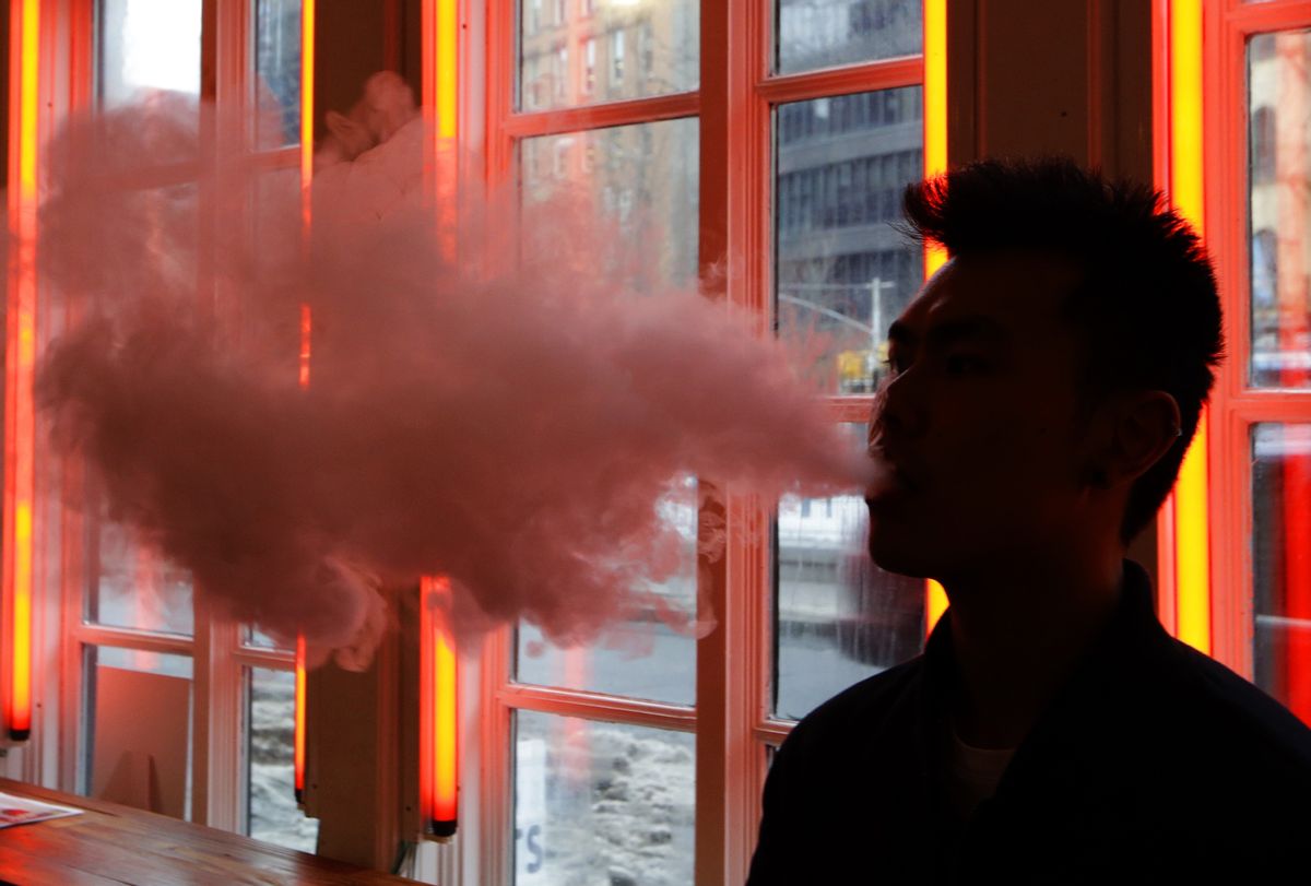 FILE - In this Feb. 20, 2014, File photo, a patron exhales vapor from an e-cigarette at the Henley Vaporium in New York. The first peek at a major study of how Americans smoke suggests many use combinations of products, and often e-cigarettes are part of the mix. It's a preliminary finding, but it highlights some key questions as health officials assess electronic cigarettes. (AP Photo/Frank Franklin II, File)  (AP)