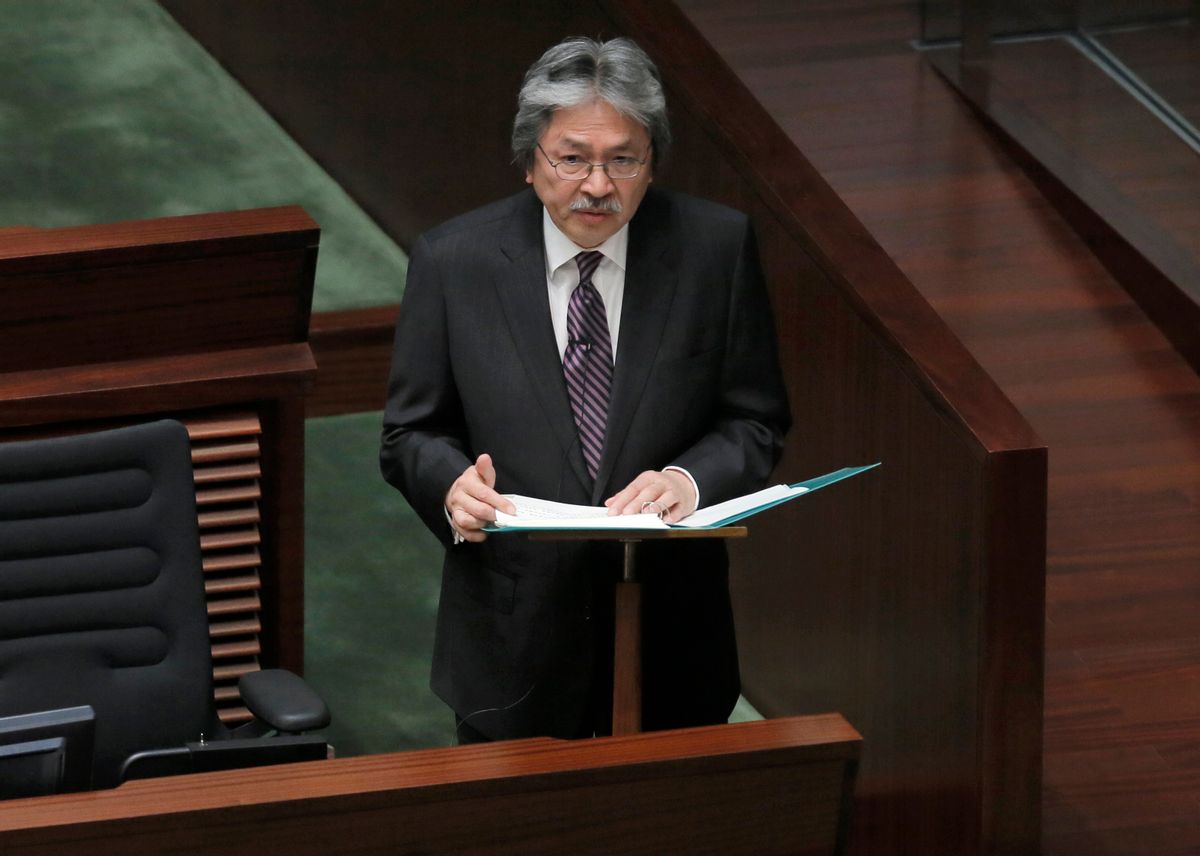 Hong Kong's Financial Secretary John Tsang delivers his annual budget speech at the Legislative Counci in Hong Kong Wednesday, Feb. 25, 2015. Tsang   unveiled $37 million in measures aimed at giving relief to some business owners and restoring confidence in the Asian financial hub following pro-democracy protests last year that choked traffic for 11 weeks. (AP Photo/Vincent Yu) (Vincent Yu)