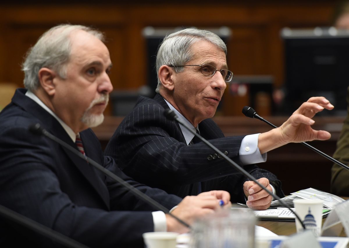 Dr. Anthony Fauci, right, Director, National Institute of Allergy and Infectious Diseases, National Institutes of Health, testifies next to Dr. Robin Robinson, Director Biomedical Advanced Research and Development Authority, U.S. Department of Health and Human Services, before the House Energy and Commerce subcommittee hearing looking into the effectiveness of vaccines in the wake of a measles outbreak and the exceptionally severe flu season, on Capitol Hill in Washington, Tuesday, February 3, 2015.  (AP Photo/Molly Riley) (AP)