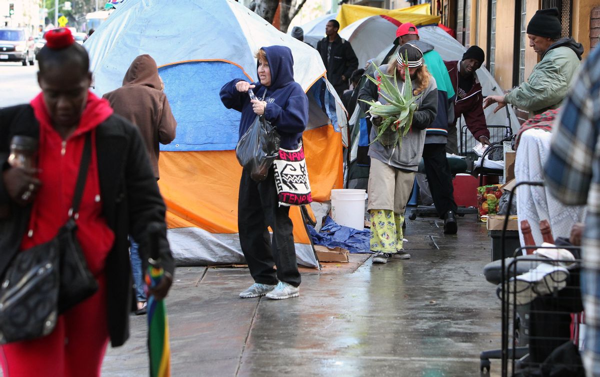 Skid Row residents start their morning, Monday, March 2, 2015. (AP Photo/Richard Vogel) (AP)