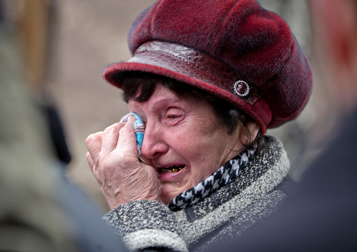 A woman cries as she waits to hear news about relatives after an explosion at  the Zasyadko coal mine in Donetsk, Ukraine Wednesday March 4, 2015.  An explosion took place underground at the Zasyadko coal mine in war-torn eastern Ukraine on Wednesday, an area controlled by pro-Russian rebels. (AP Photo/Vadim Ghirda) (AP)