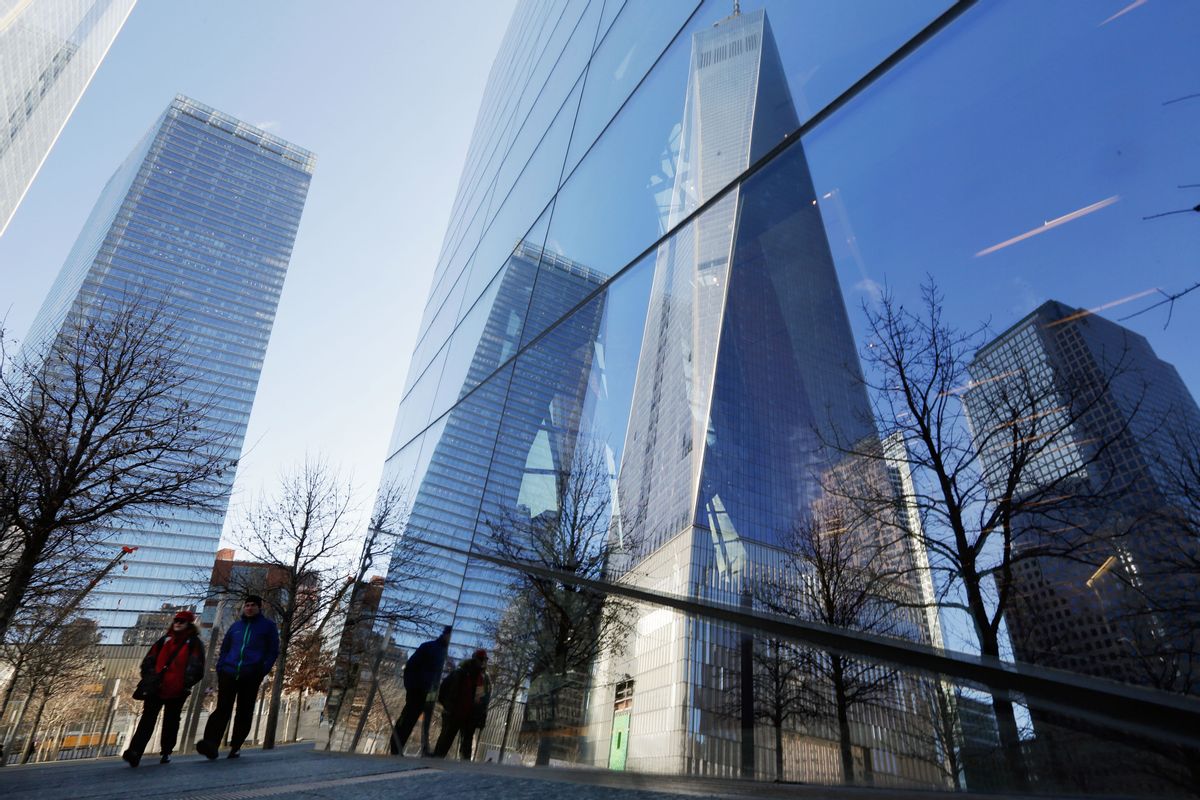 The One World Trade Center building, second from right, is reflected in the windows of the 9/11 Museum, in New York,  Monday, March 23, 2015. The first stair-climb benefit will be held at One World Trade Center in May to raise money for military veterans, two foundations, the Stephen Siller Tunnel to Towers Foundation and the Captain Billy Burke Foundation, formed after the 9/11 attacks announced Monday. (AP Photo/Richard Drew) (AP)