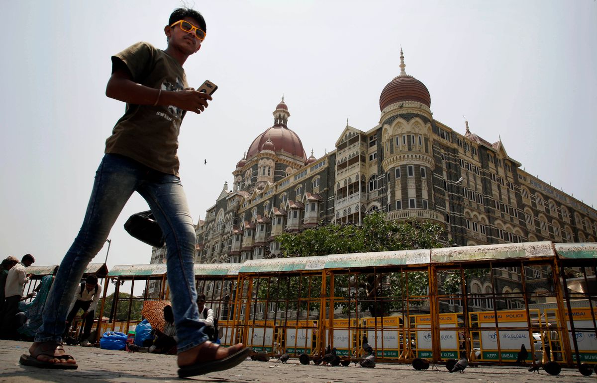 An Indian man walks outside the Taj Mahal hotel, which was one of the sites of the Mumbai terror attack, in Mumbai, India, Friday, April 10, 2015. A Pakistani court on Thursday, April 9, 2015, ordered the release of the main suspect Zaki-ur-Rehman Lakhvi in the 2008 Mumbai attacks for the second time in less than a month, a defense lawyer said. (AP Photo/Rajanish Kakade) (Rajanish Kakade)