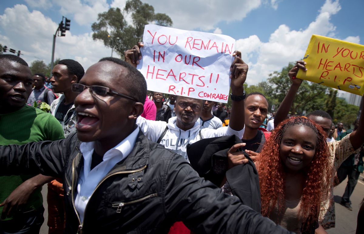 Kenyan students, some wearing black to represent mourning, march in memory of the victims of the Garissa college attack and to protest what they say is a lack of security, in downtown Nairobi, Kenya Tuesday, April 7, 2015. Hundreds of Kenyan students marched through downtown Nairobi on Tuesday to honor those who died in the attack on a college by Islamic militants and to press the government for better security in the wake of the slaughter. (AP Photo/Ben Curtis) (AP)