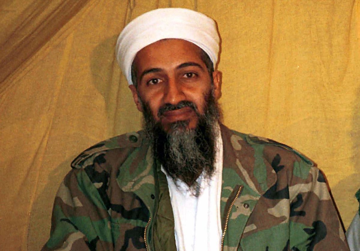 FILE - This undated file photo shows al Qaida leader Osama bin Laden in Afghanistan. U.S. intelligence officials have released more than 100 documents seized in the raid on Osama bin Ladens compound, including a loving letter to his wife and a job application for his terrorist network. The Office of the Director of National Intelligence says the papers were taken in the Navy SEALs raid that killed bin Laden in Pakistan in 2011.  (AP Photo, File)