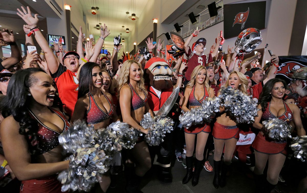 The Tampa Bay Buccaneers cheerleaders celebrate along with fans after the team drafted former Florida State quarterback Jameis Winston during an NFL draft party Thursday, April 30, 2015, in Tampa, Fla. Winston was the first overall pick in the draft. (AP Photo/Chris O'Meara) (AP)