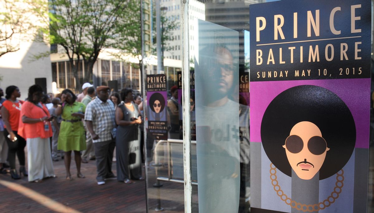 Fans line up outside Royal Farms Arena before Prince's Baltimore concert Sunday, May 10, 2015. (Jerry Jackson/The Baltimore Sun via AP) (AP)