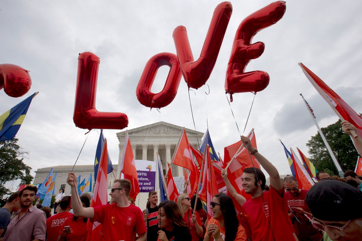 Balloons spell out the word "love" over the Supreme Court in Washington, Friday June 26, 2015, after the court declared that same-sex couples have a right to marry anywhere in the US.  (AP Photo/Jacquelyn Martin) (AP)