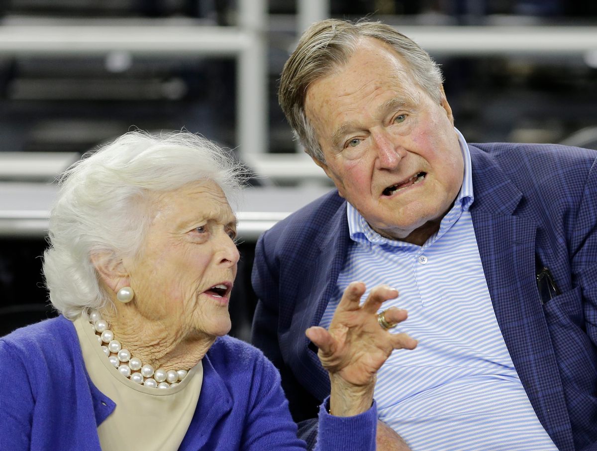 FILE- In this March 29, 2015, photo, former President George H.W. Bush and his wife Barbara Bush speak before the first half of a college basketball game in Houston. The former first lady is promoting literacy on her 90th birthday by lending her backing to a $7 million challenge by X Prize and Dollar General. Theyre challenging developers to create a mobile app to help improve adult literacy skills. (AP Photo/David J. Phillip, File)  (AP)
