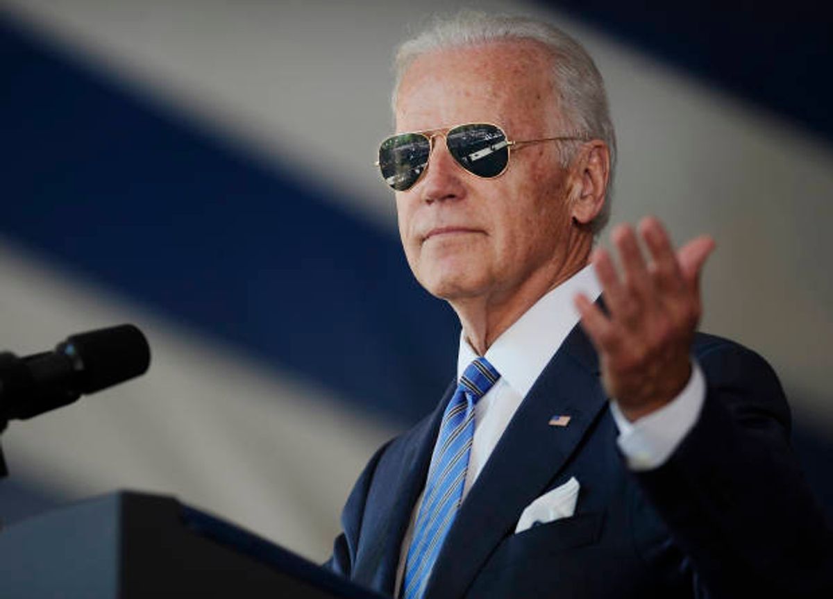 FILE - In this May 17, 2015, file photo, Vice President Joe Biden gestures after donning a pair of sunglasses as he delivers the Class Day Address at Yale University in New Haven, Conn. Graduation season is winding down but among the eight commencement addresses given this year by three of the biggest names, President Barack Obama, first lady Michelle Obama and Vice President Joe Biden, a few moments stood out that may last a little longer. (AP Photo/Jessica Hill, File) (AP)