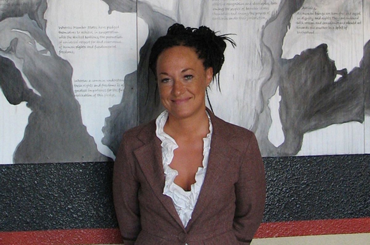 Rachel Dolezal in 2009, standing in front of a mural she painted at the Human Rights Education Institute's offices in Coeur d'Alene, idaho.               (AP/Nicholas K. Geranios)