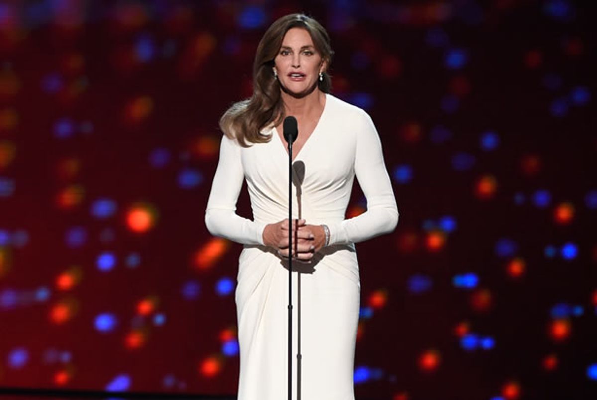  Soccer player Abby Wambach, of the United States women's national soccer team, left, looks on as Caitlyn Jenner accepts the Arthur Ashe award for courage at the ESPY Awards at the Microsoft Theater on Wednesday, July 15, 2015, in Los Angeles. (Photo by Chris Pizzello/Invision/AP)  