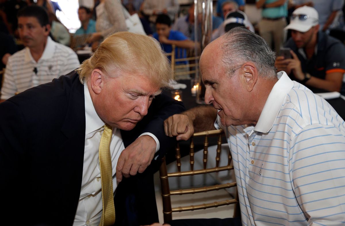 Republican presidential candidate Donald Trump, left, talks the former New York City mayor Rudy Giuliani at a fundraising event in the Bronx borough of New York, Monday, July 6, 2015. (AP Photo/Seth Wenig)  (AP)