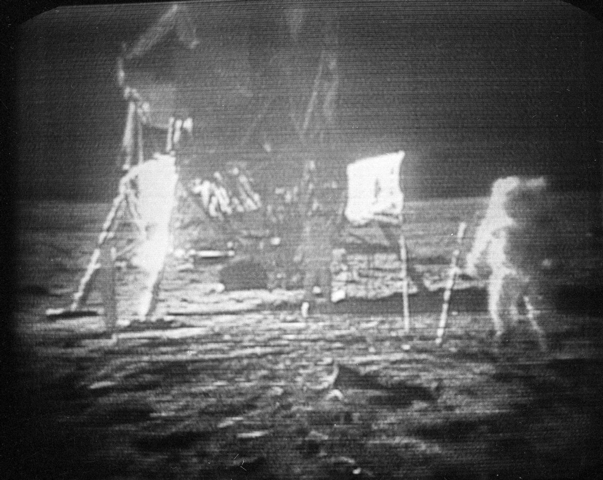 FILE - In this July 20, 1969 file photo, Apollo 11 astronaut Neil Armstrong, right, trudges across the surface of the moon leaving behind footprints. The National Air and Space Museum is launching a crowdfunding campaign to conserve the spacesuit Neil Armstrong wore on the moon. The campaign begins Monday, marking 46 years since Armstrongs moonwalk in 1969. Conservators say spacesuits were built for short-term use with materials that break down over time. The museum aims to raise $500,000 on Kickstarter to conserve the spacesuit, build a climate-controlled display case and digitize the spacesuit with 3D scanning.  (AP Photo, file) (AP)