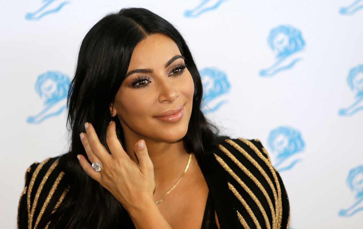 American television personality Kim Kardashian poses for photographers as she attends the Cannes Lions 2015 in Cannes, southern France, Wednesday, June 24, 2015. The Cannes Lions International Advertising Festival is a global meeting place for professionals in the communications industry. (AP Photo/Lionel Cironneau) (Lionel Cironneau)
