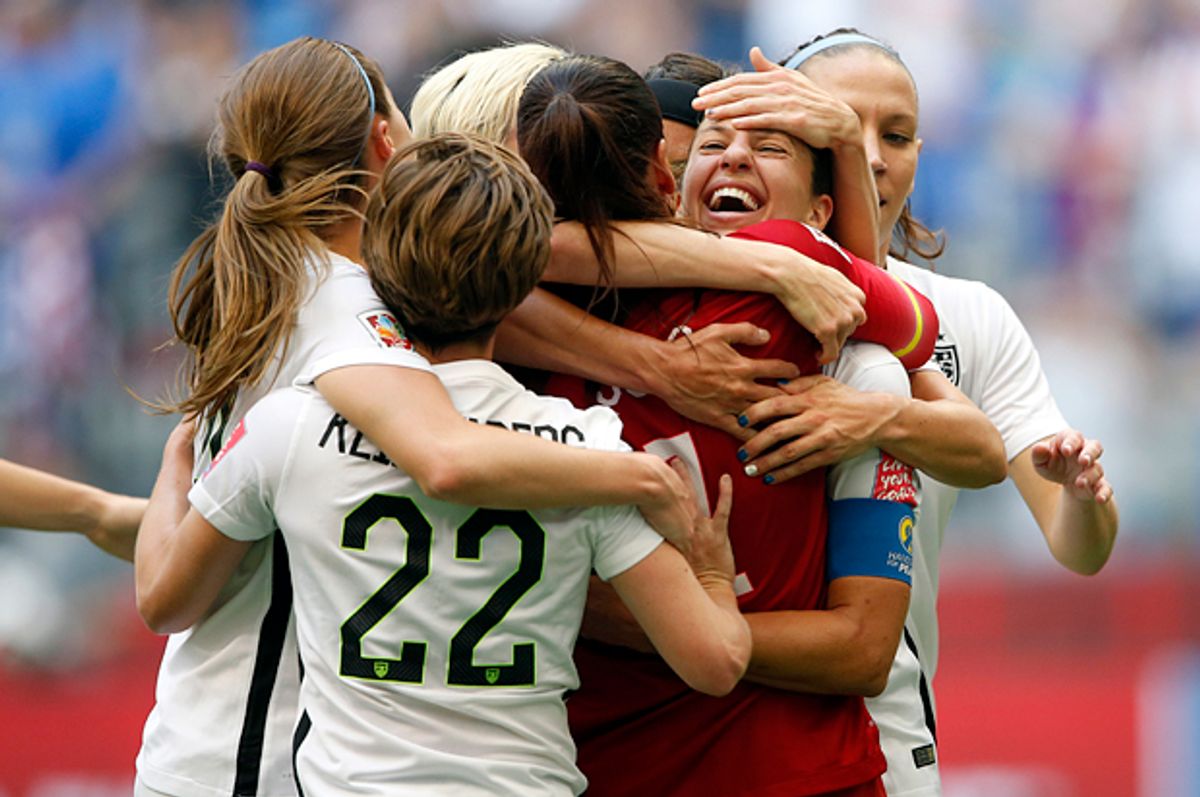 Carli Lloyd celebrates with teammates after scoring against Japan in the final of the FIFA 2015 Women's World Cup, Jul 5, 2015.        (Reuters/Michael Chow/USA Today)