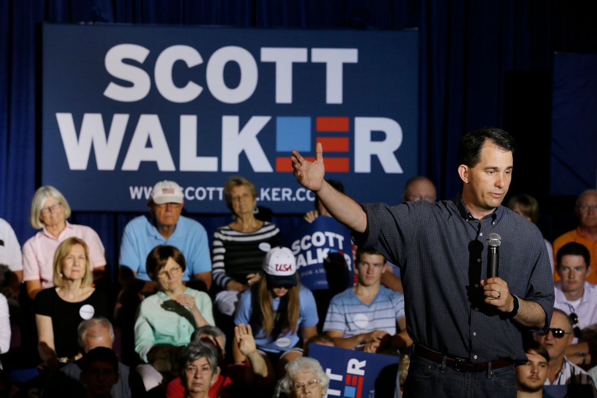 FILE - In this July 17, 2015 file photo, Republican presidential candidate Wisconsin Gov. Scott Walker speaks in Cedar Rapids, Iowa. Walker and fellow candidate Carly Fiorina and Scott Walker are to speak at gathering hosted by the conservative political donors Charles and David Koch. (AP Photo/Charlie Neibergall, File) (AP)