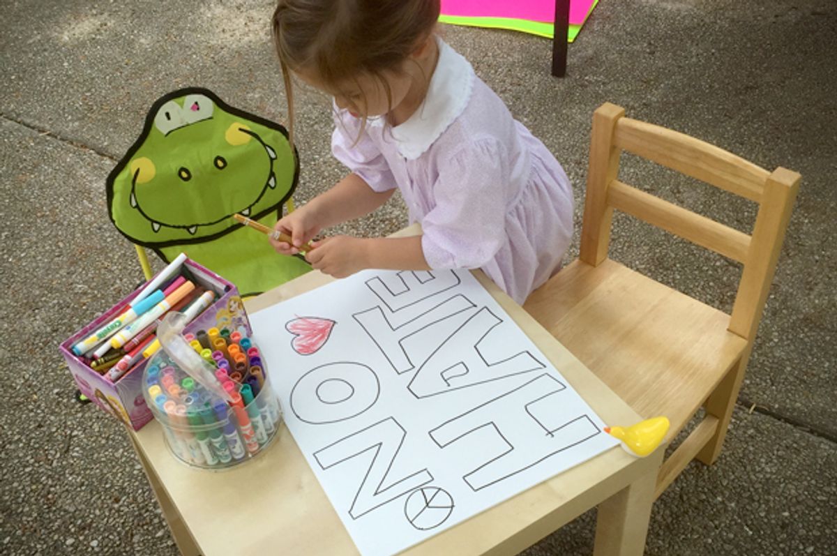 A photo of the author's daughter, making signs.   (Ben Carlisle)