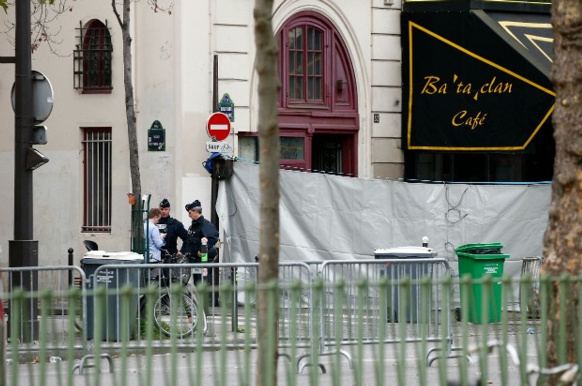 Police work outside the Bataclan Cafe and its adjoining concert hall. (Benoit Tessier/Reuters)